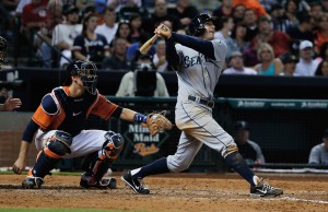 HOUSTON, TX - JULY 19:  Brad Miller #5 of the Seattle Mariners connects on a two run home run in the sixth inning against the Houston Astros at Minute Maid Park on July19, 2013 in Houston, Texas.  (Photo by Scott Halleran/Getty Images)