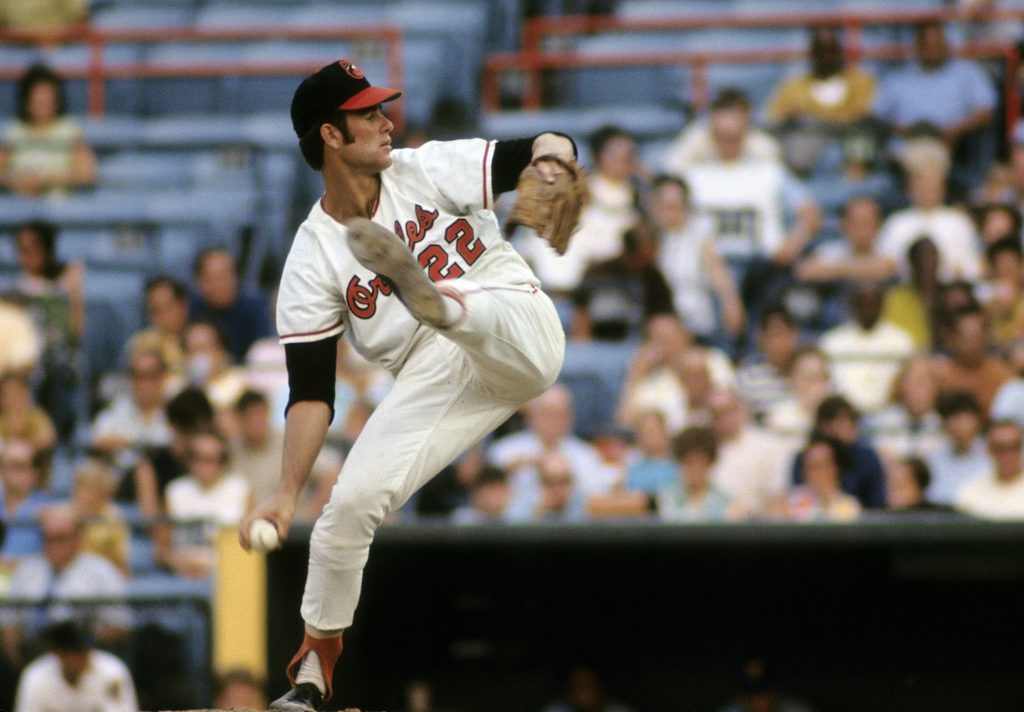 BALTIMORE, MD - CIRCA 1970s: Pitcher Jim Palmer #22 of the Baltimore Orioles pitches during circa early 1970s Major League Baseball game at Memorial Stadium in Baltimore, Maryland. Palmer played for the Orioles from 1965-84. (Photo by Focus on Sport/Getty Images)